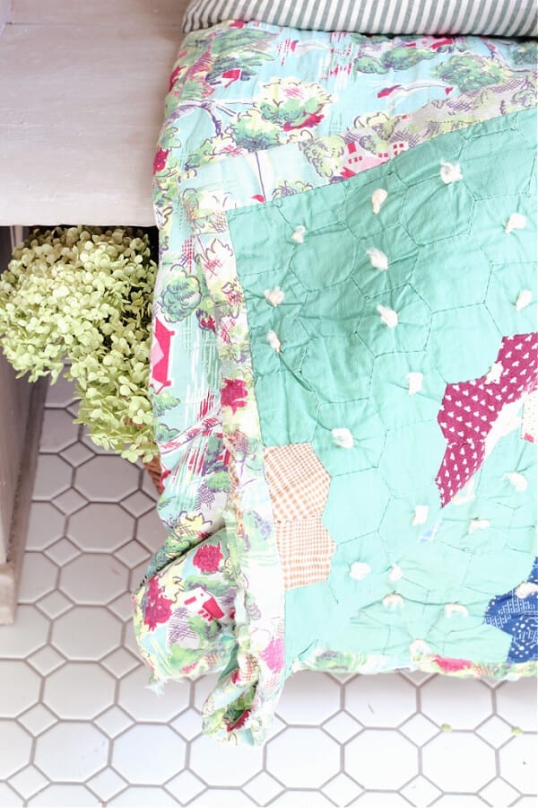 A green double sided vintage quilt adds Spring perfection tour entry.