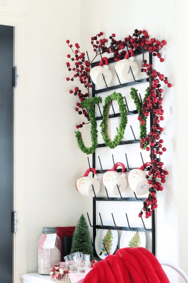 A mug rack, sant mugs and peppermint sticks make our hot cocoa bar a family favorite!