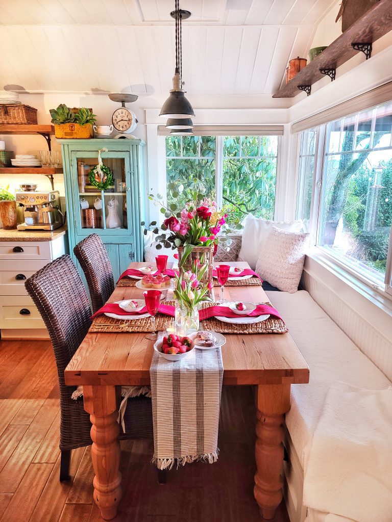 Garden inspired Valentine's Day tablescape with tulips and pops of color.