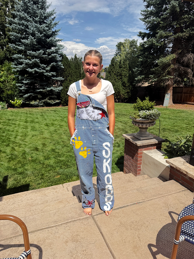 Grace in her senior overalls