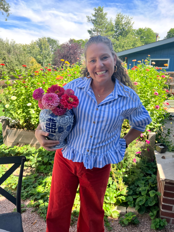Kelly in blue striped shirt
