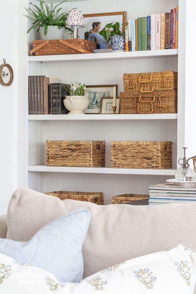 Welcome Home Sunday: Bookshelf with beadboard wallpaper.