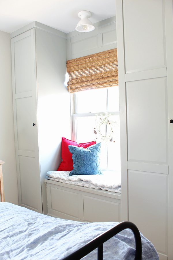 Bedroom nook with pillows and wreath