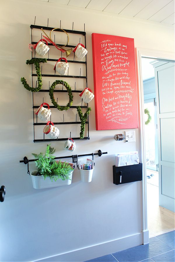 Santa mugs in our mudroom!