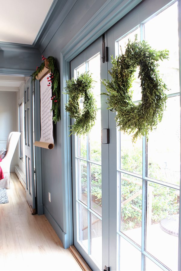 Boxwood wreaths on our kitchen doors.