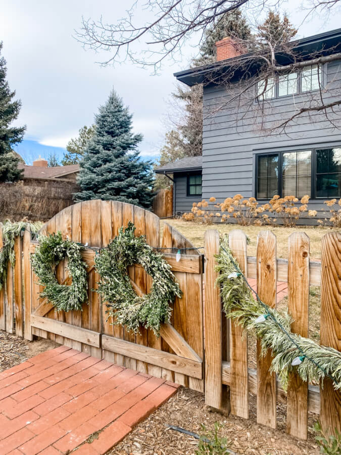 Christmas greenery on our fence and gates.