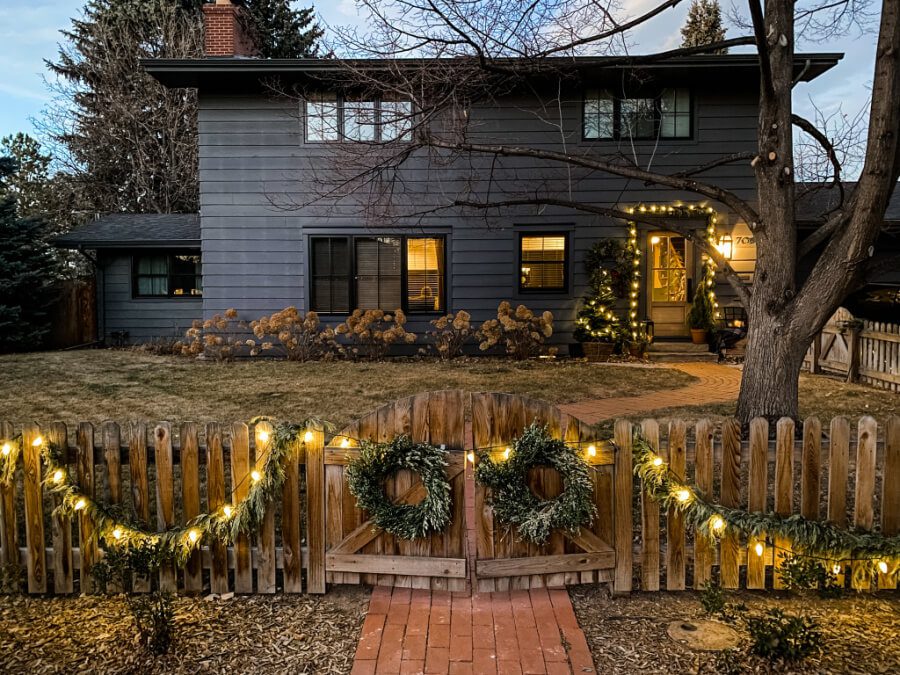 Our home decorated for Christmas with lights on in the evening.