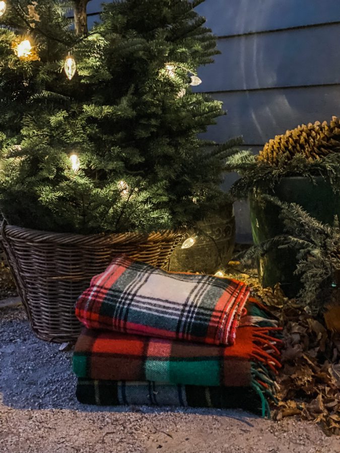 Vintage plaid blankets on our Christmas steps!