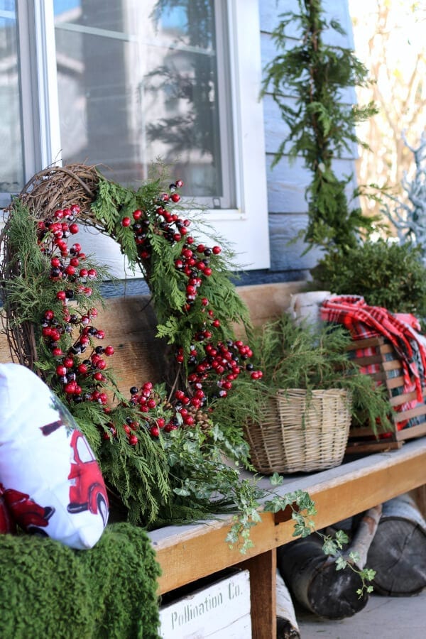 Christmas on our porch means large wreaths and fresh greenery!