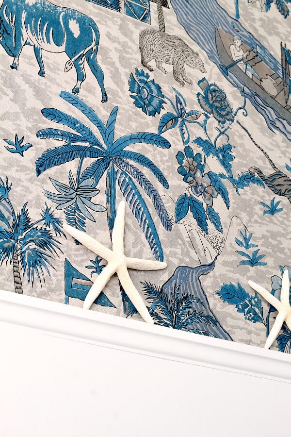 This gorgeous Thibaut wallpaper adds that perfect coastal cottage feel to our newly made over master bedroom!