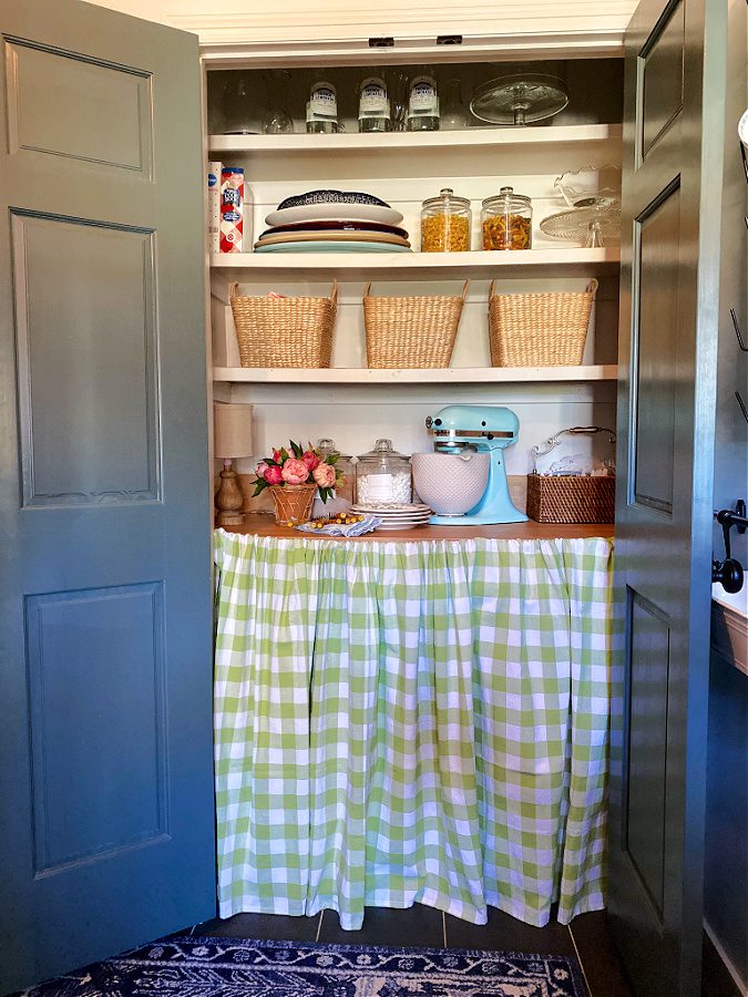 Our butlers pantry with a checked skirt/curtain.