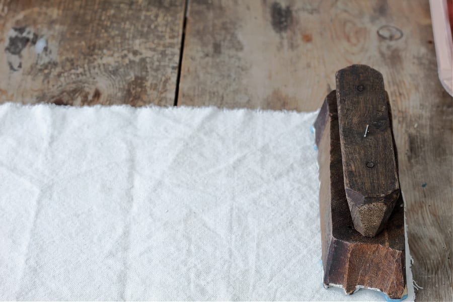 starting the block print stamping onto drop cloth