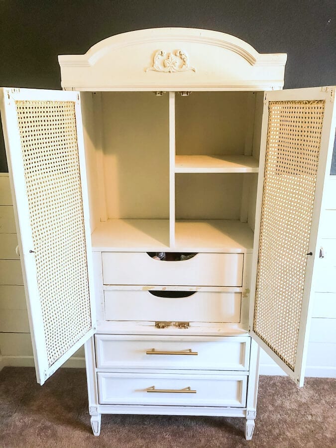 With a little paint and some cane webbing for the doors this armoire was ready to be the star of the bedroom!