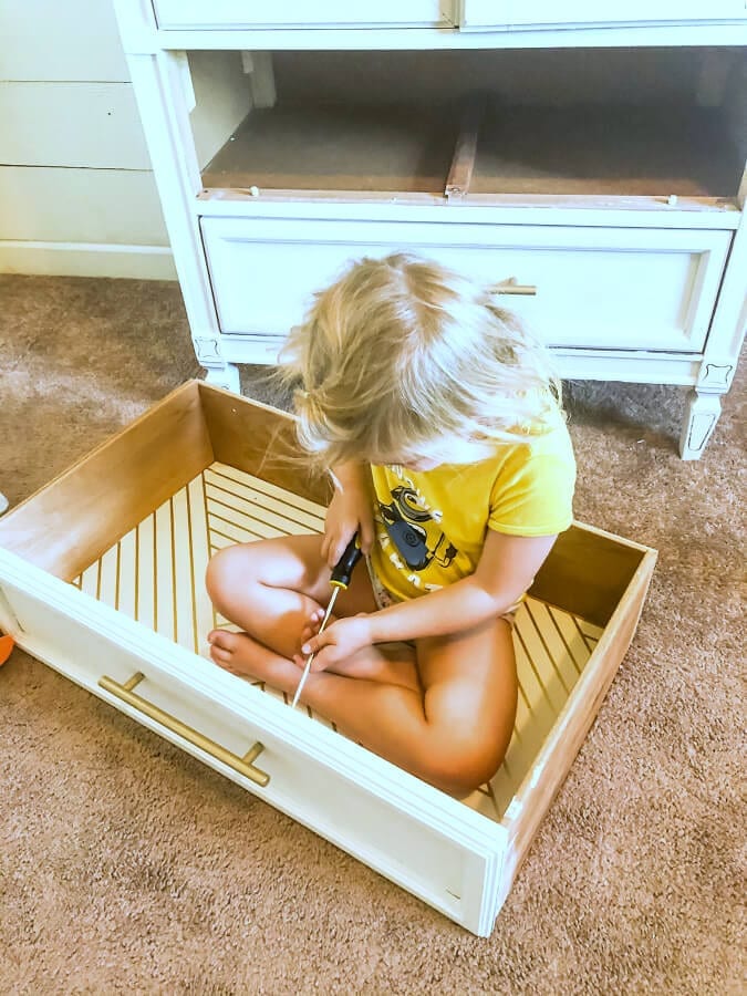 My sweet niece excited about her new piece of bedroom furniture!