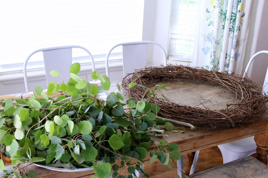 greenery and grapevine wreath-preparing to make a wreath