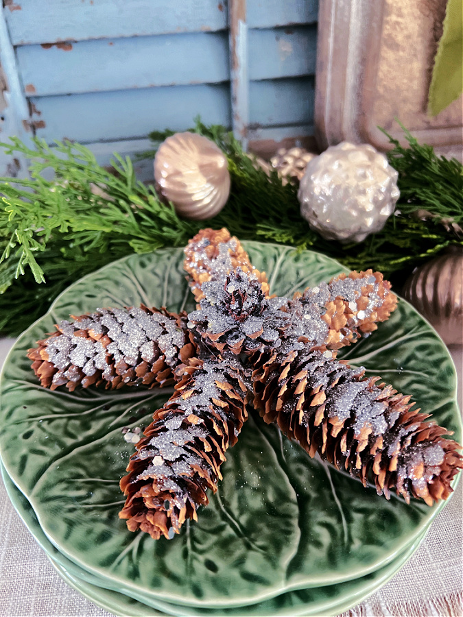 DIY pine cone star ornament with glitter