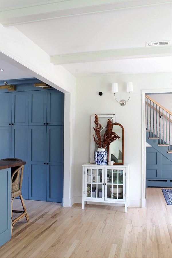 Fall leading into our kitchen...natural branches and blue cabinets.