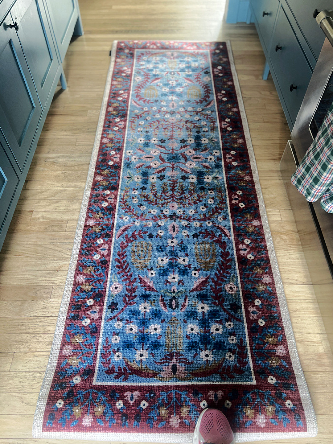 red and blue runner in kitchen