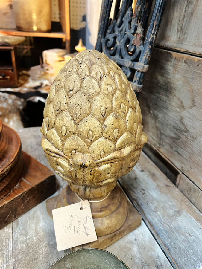 concrete finial at flea market