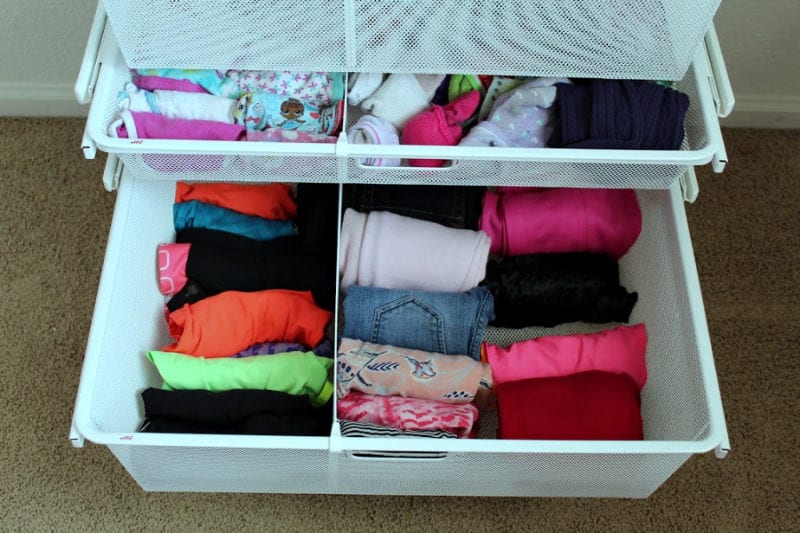 Organized drawers in kids closet.