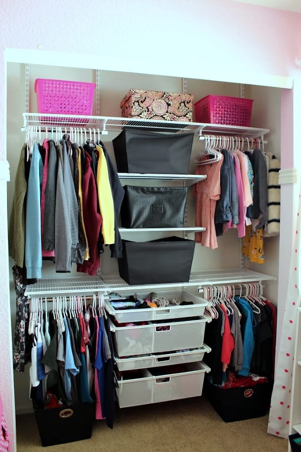 a shared kids closet perfectly organized