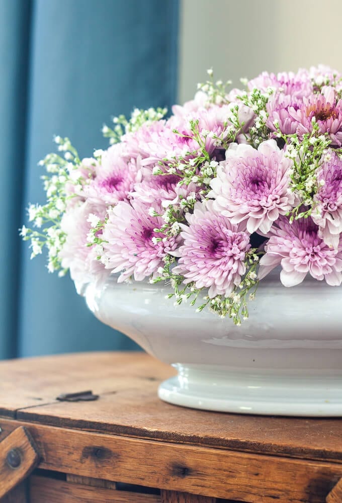 Welcome Home Saturday: How To Make a Beautiful Flower Arrangement | Welcome Home Saturday by popular Alabama lifestyle blog, She Gave It A Go: image of a a purple mum and baby's breath flower arrangement in a white vase. 