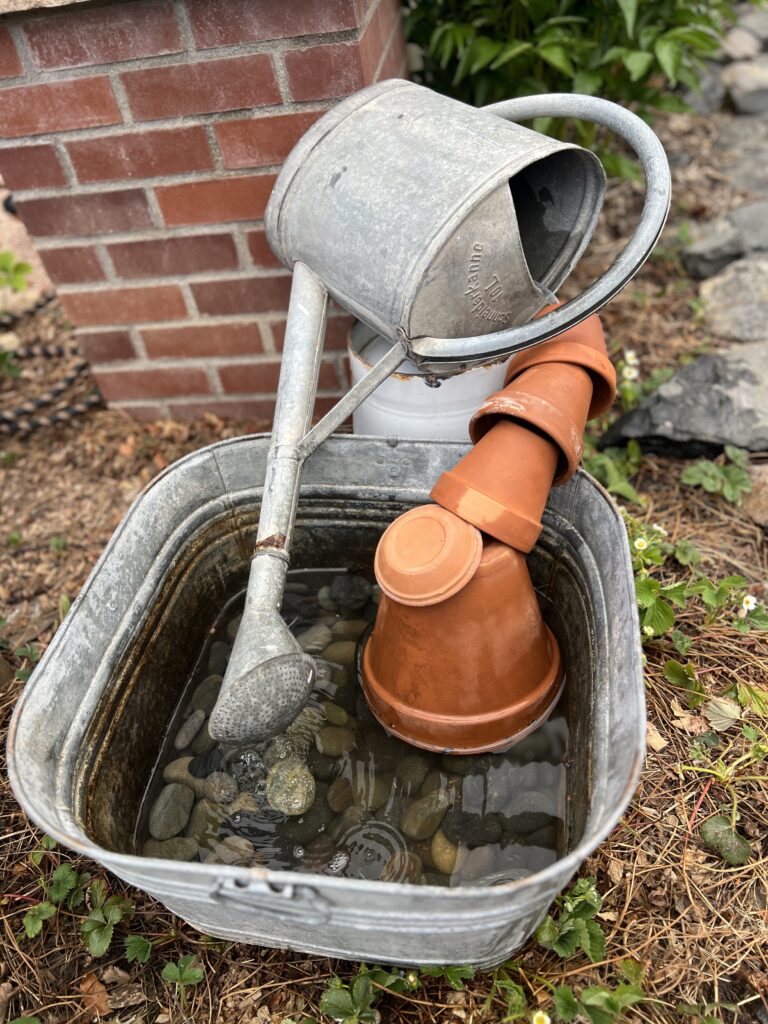 Looking for a simple way to elevate your garden? This DIY watering can fountain uses a solar pump—no electricity required! It’s an easy, budget-friendly project that adds cozy cottage charm and the relaxing sound of water to your backyard. Perfect for zinnia gardens, raised beds, and beginner gardeners who want a low-effort, high-impact idea.