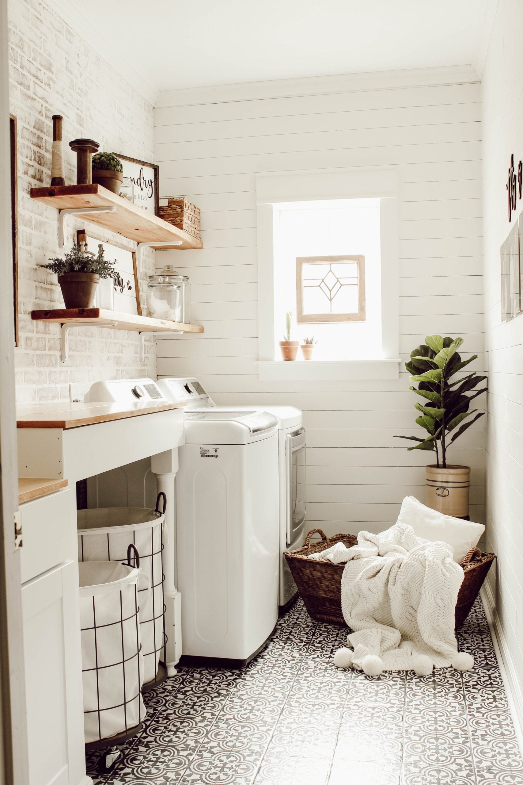 Laundry room faux brick wall.