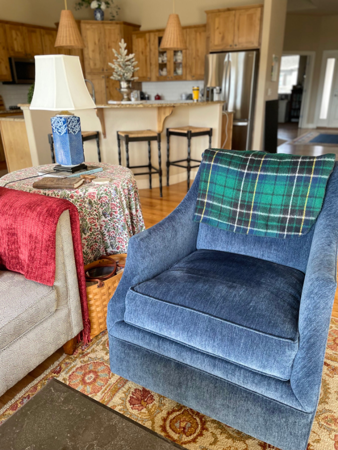plaid throw on blue swivel
