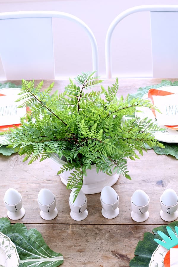 A fun and colorful Easter table with jadeite and Rae Dunn accents.