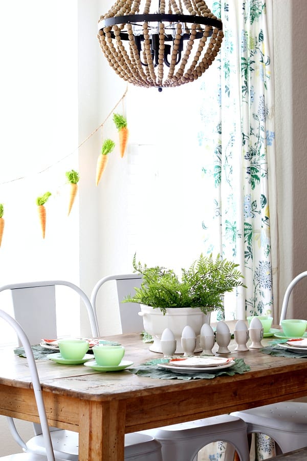 A sweet little Easter tablescape featuring jadeite and Rae Dunn.