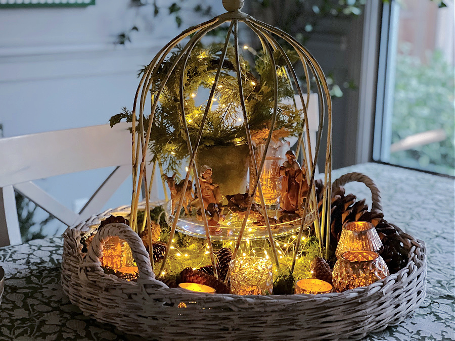 evening view of lit up nativity centerpiece