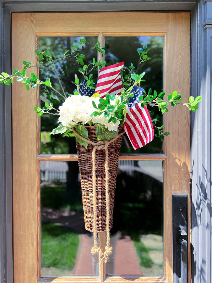 Gorgeous DIY patriotic door basket on our wood door