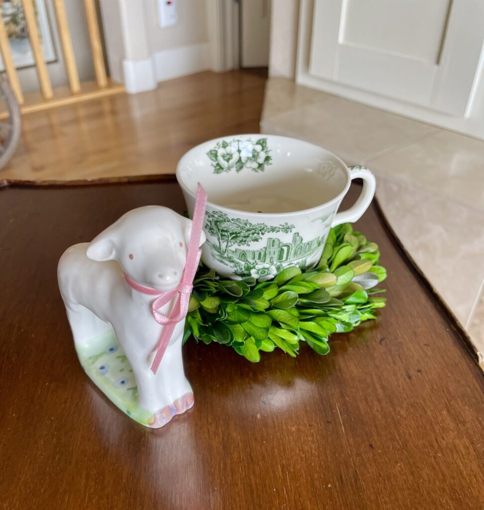 tea cup and porcelain lamb