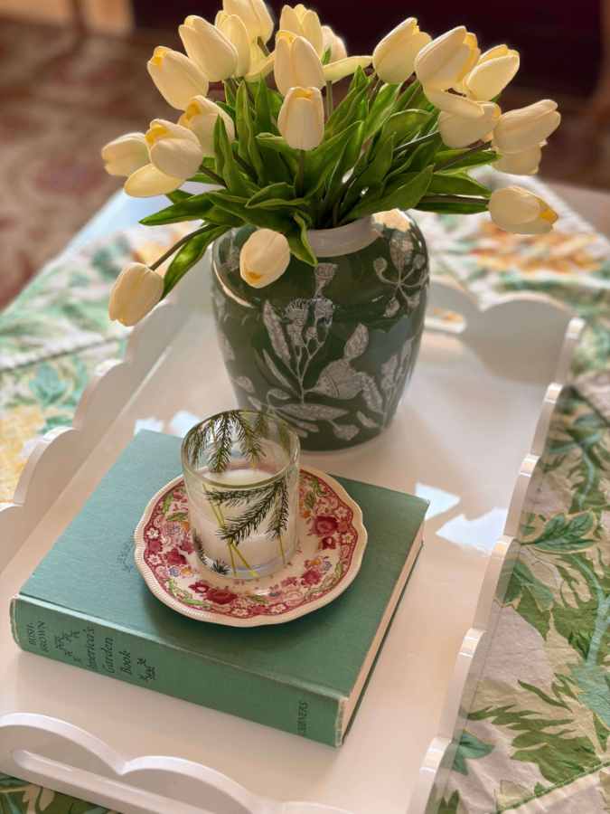 spring tray green book and tulips