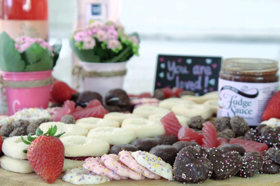 A pink and red Valentine's Day Dessert Charcuterie Board.