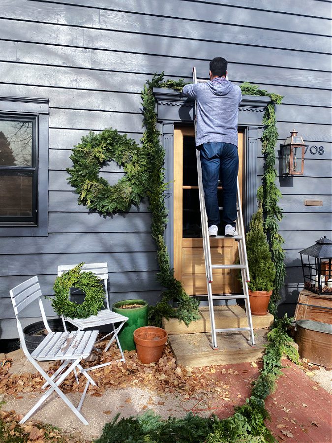 Welcome Home Saturday adding some Christmas greenery to our house!