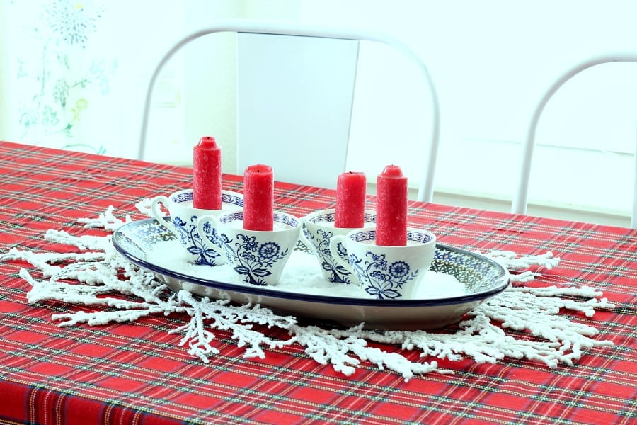 A homeade Advent wreath with candles, tea cups and epson salt!