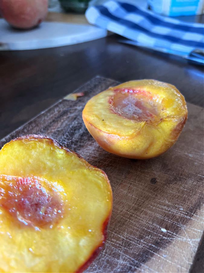 halving the peaches before I air fry them