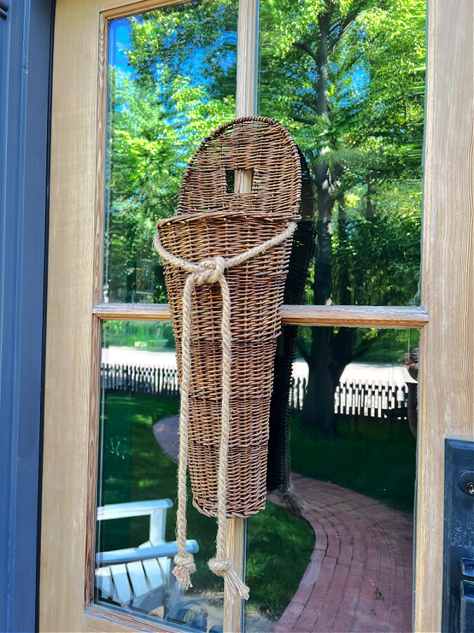 Hanging door basket ready to be filled with greenery, flowers and flags!