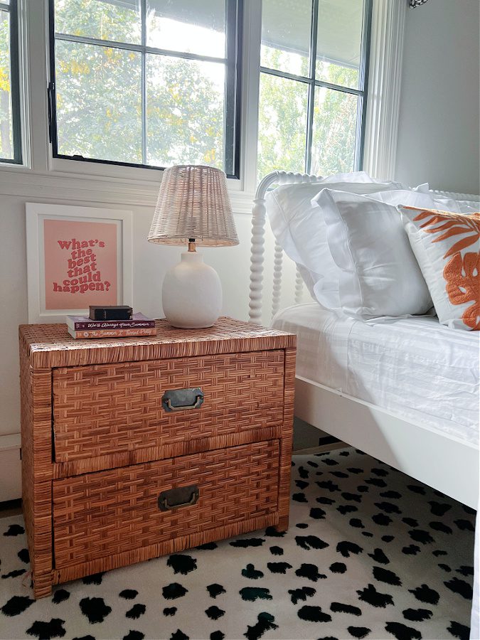 Bamboo nightstand in beachy bedroom