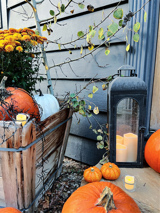 battery operated candles on Halloween porch steps