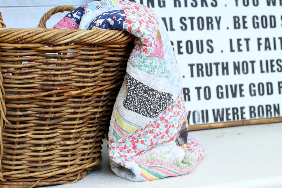 A basket with a quilt is an easy way to decorate with color for summer!