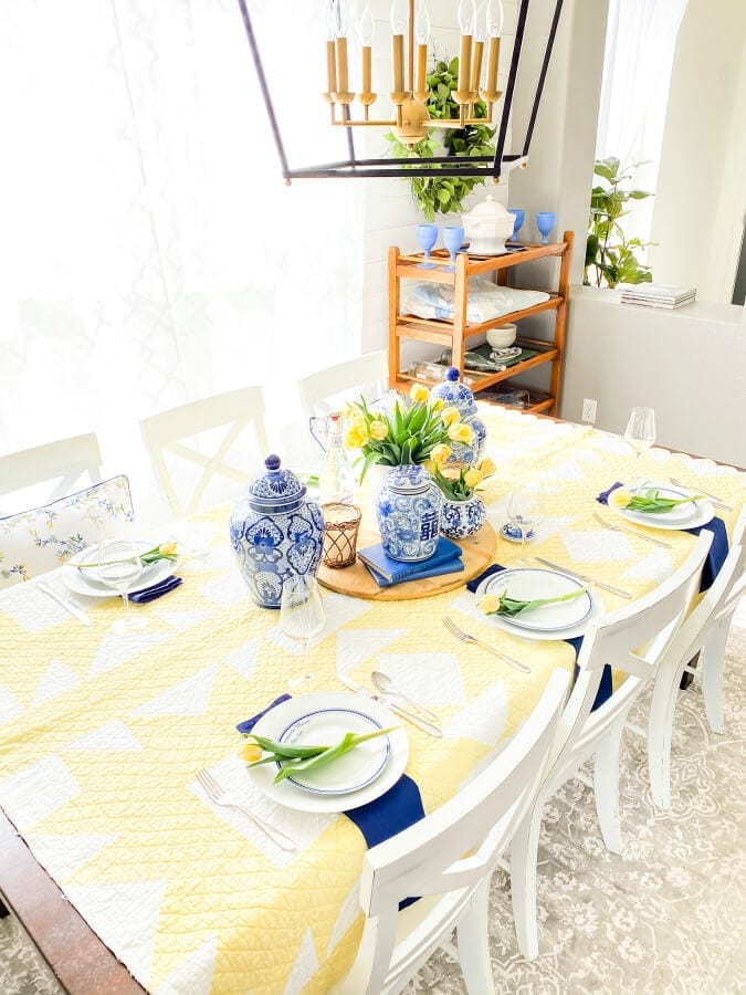 A blue and yellow Mother's Day tablescape.