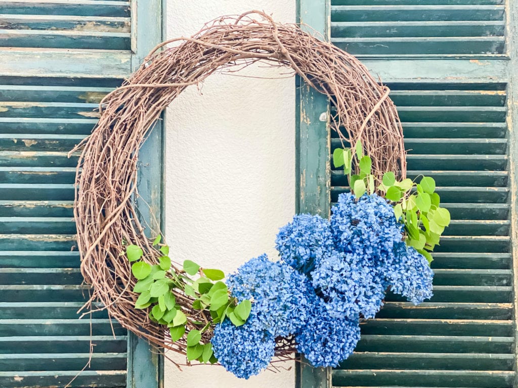 This DIY wreath is made with spray painted dried hydrangeas!