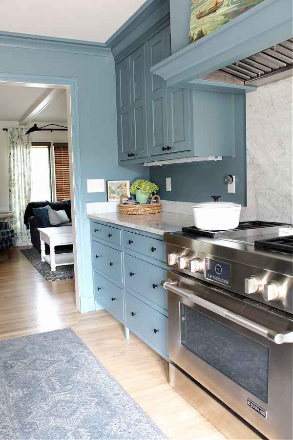 Our kitchen with Distance blue cabinets by Sherwin Williams.