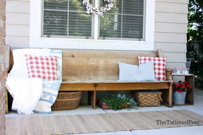 Front porch decor with a patriotic theme.