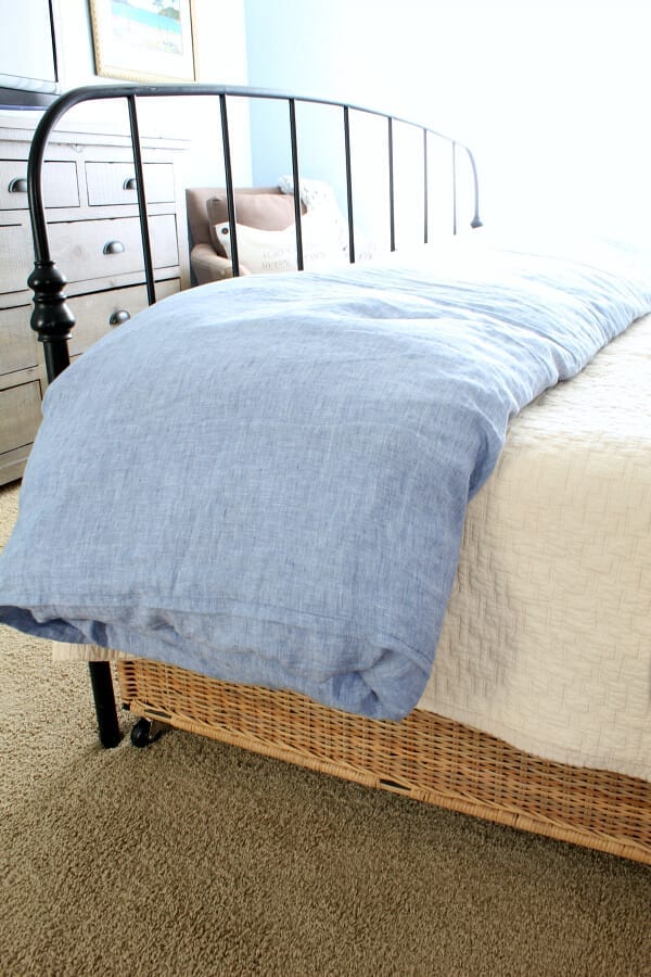 A chambray linen duvet may be a splurge but it well worth it when it come to beachy bedding and comfort!