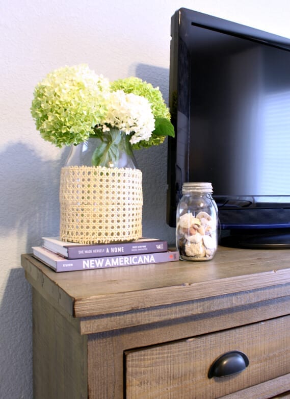 Hydrangeas, shells and a DIY cane vase vignette.