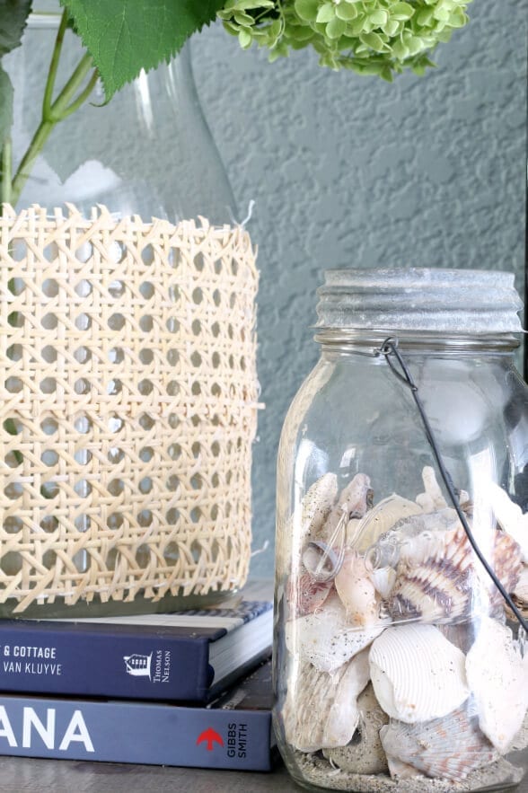 Displaying a personal collection of shells is a great way to decorate with a coastal feel in your bedroom!